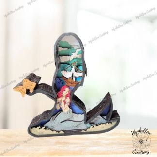 Mermaid outline with ocean scene. Waves and ship with mermaid on the rocks