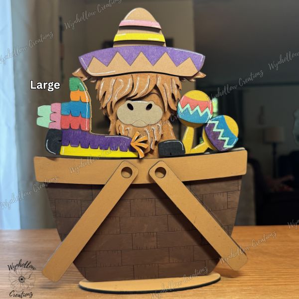 Highland Cow celebrating Cinco De Mayo with maracas, pinatas, sombreros, and bright colors