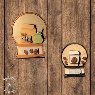 Coffee Wood Interchangeable Snow Globe Insert — Choose your base and size. The large features the Life Happens, Coffee Helps design with a coffee bag, sugar jar, and beans, while the small includes the Coffee Because Adulting Is Hard to‑go cup. Crafted in layered wood for comforting everyday charm and easy interchangeable decorating.